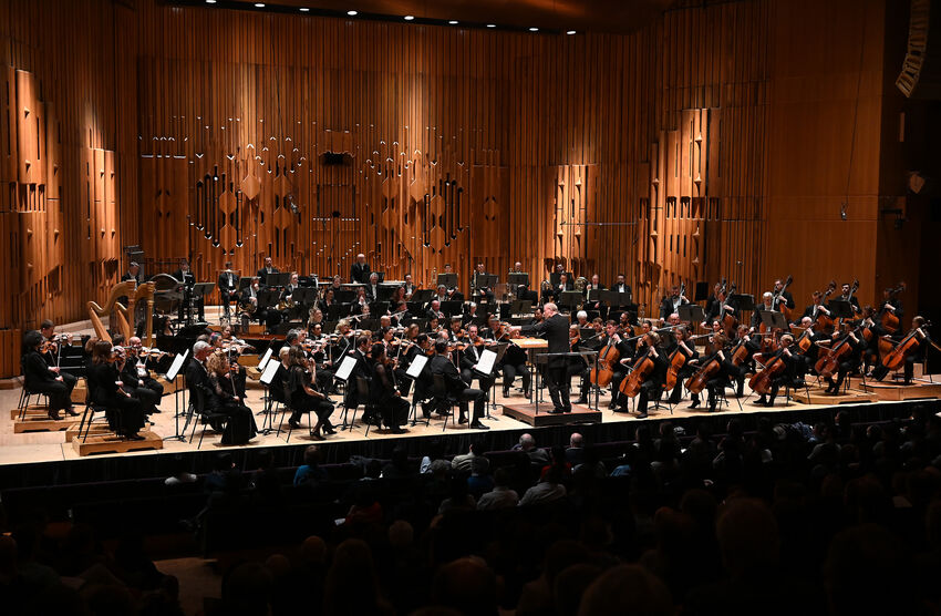 London Symphony Orchestra performing on stage