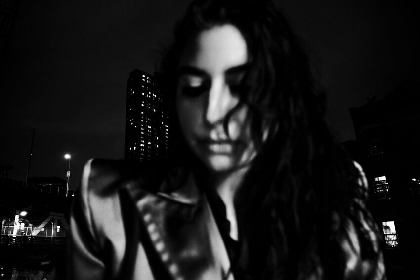 A soft focus black & white photo of Arooj,