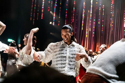 A group of people are dancing