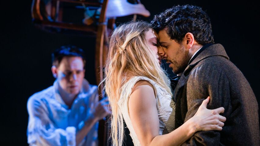 Cathy and Heathcliff embrace