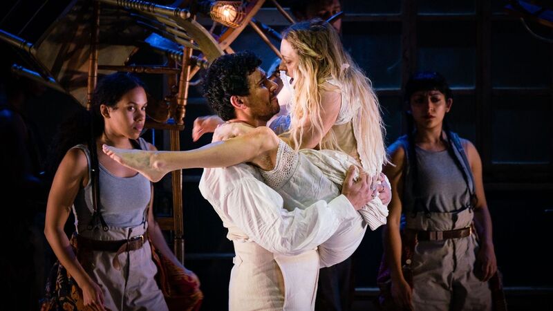 Healthcliff holds Cathy aloft as the ensemble look on