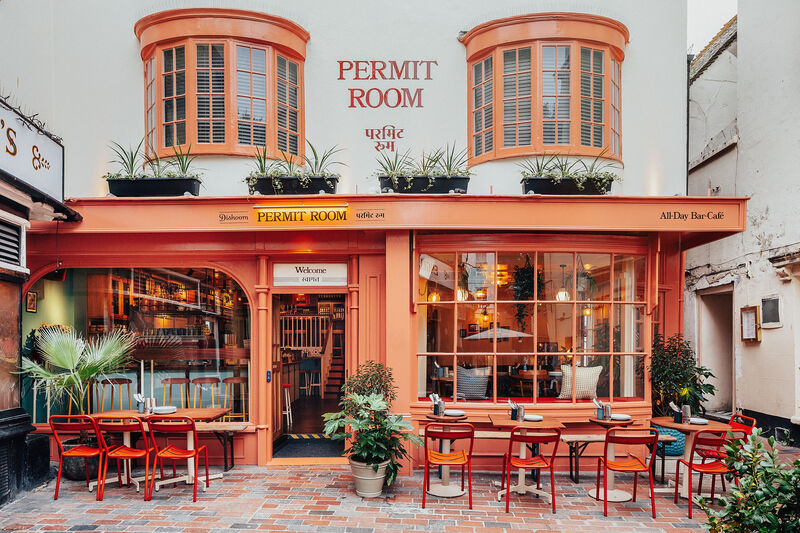 The colourfuln orange and white exterior of Permit Room brighton