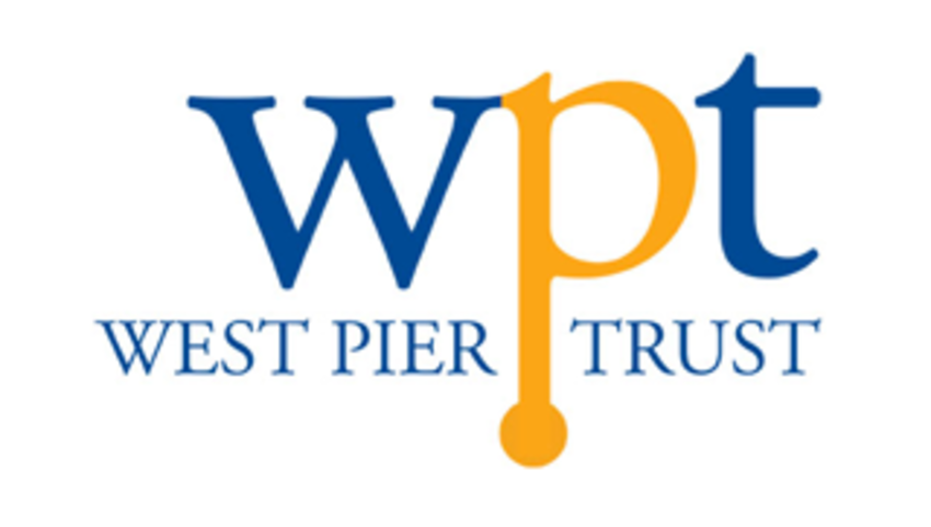 WPT west pier trust written in blue and orange