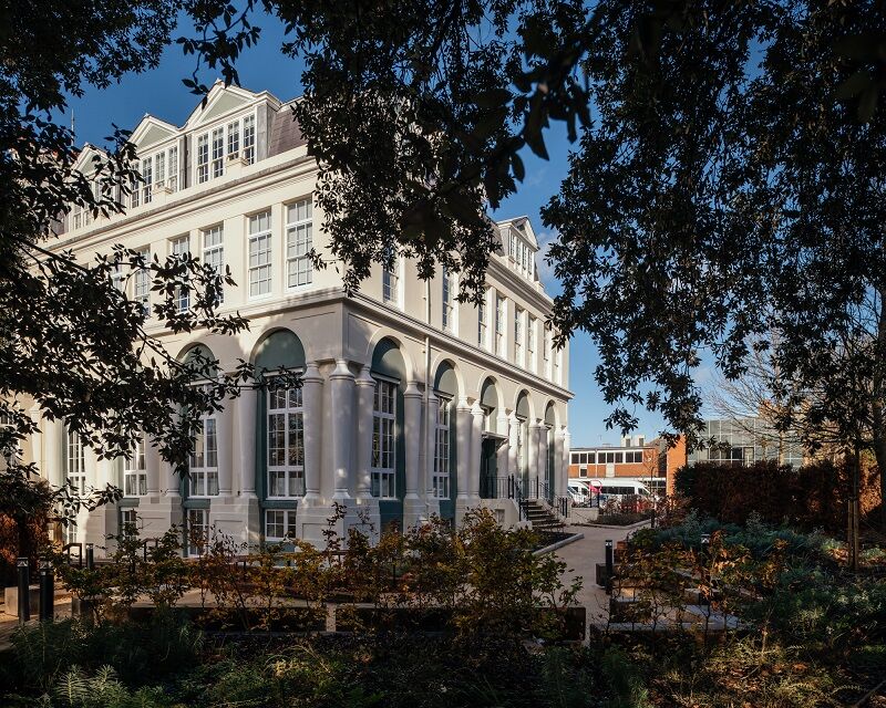 External shot of Brighton Girls school, viewed through some trees