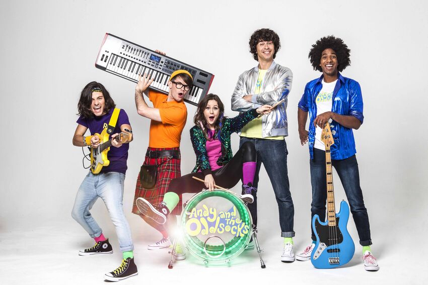 A band pose with their instruments