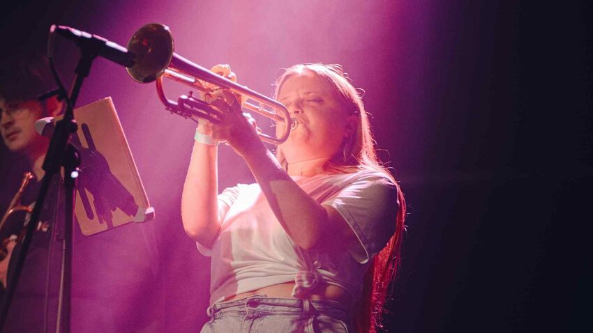 Woman playing trumpet